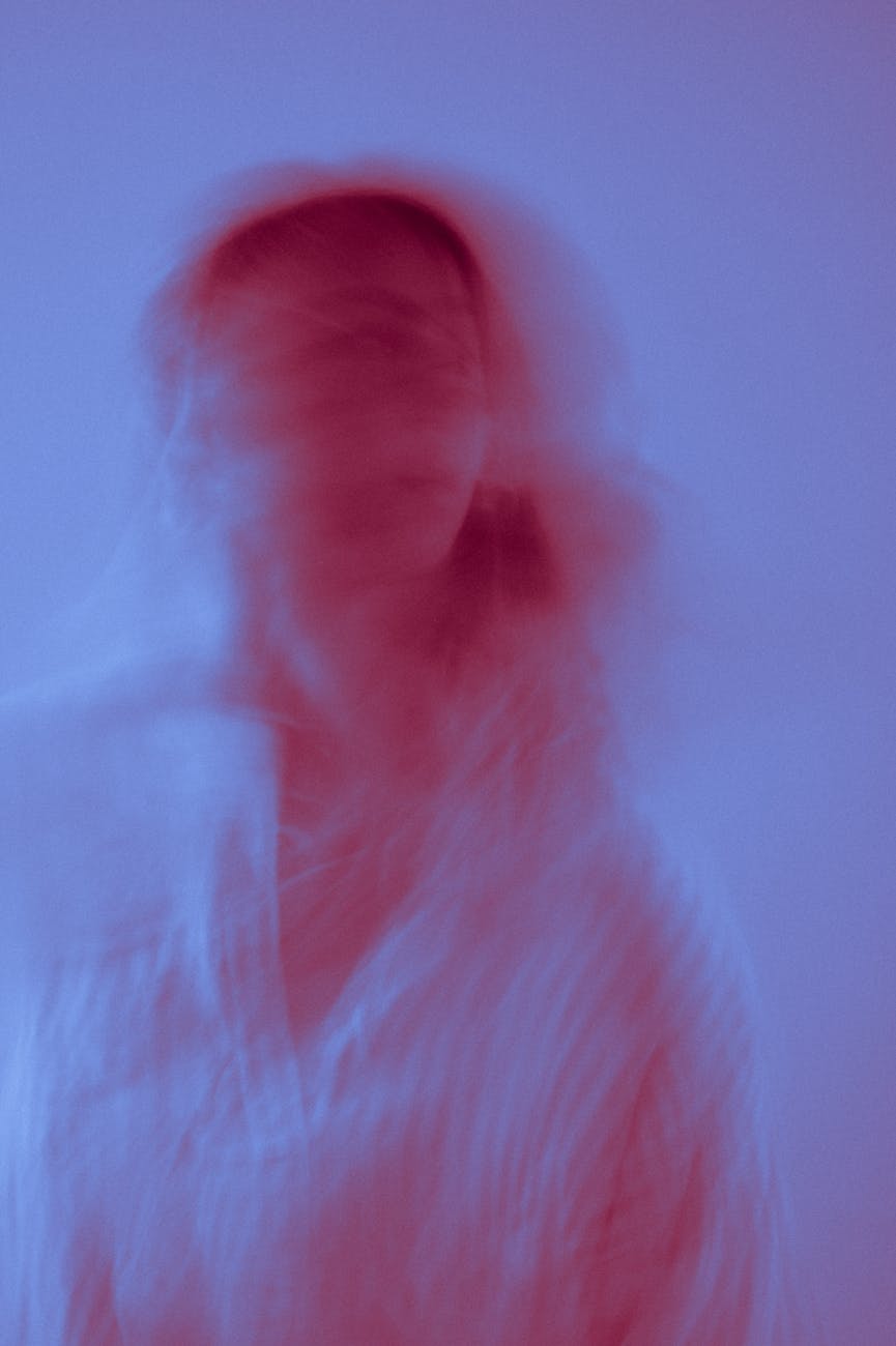 blurry creative photo of a woman wearing a shirt